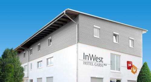Inwest Hotel Garni Крайльсхайм Экстерьер фото